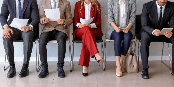 Junior, Middle, and Senior developers sit together on the bench.