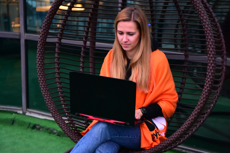 employee on the terrace with laptop photo